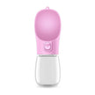 Pink and clear portable pet water bottle on a white background