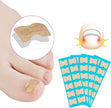 Pedicure patch on a foot with packaging of patches on a white background