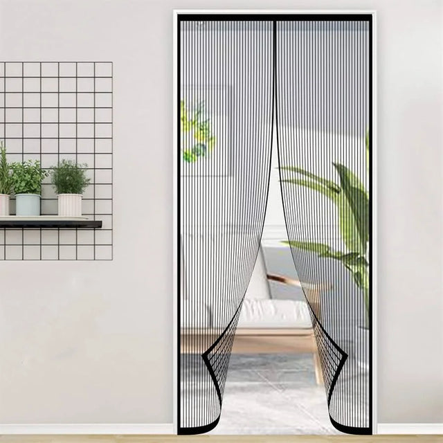 Magnetic screen door with a modern interior setting featuring plants and a shelf.