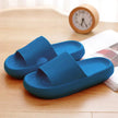 Blue slides on a wooden surface with a clock in the background