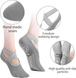 Gray yoga socks with text highlighting features on a white background