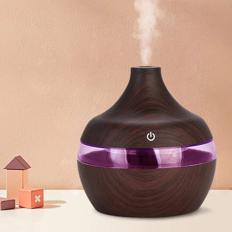 Wooden-patterned diffuser with purple accent on a beige background