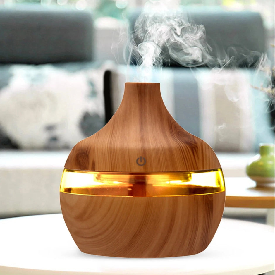 Wooden diffuser emitting mist in a living room setting