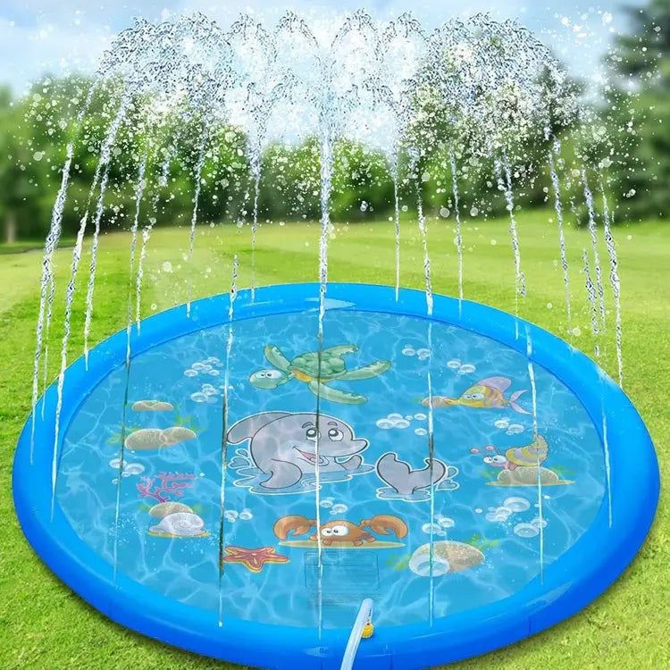 Inflatable splash pad with water sprays and cartoon sea creatures on a grassy background