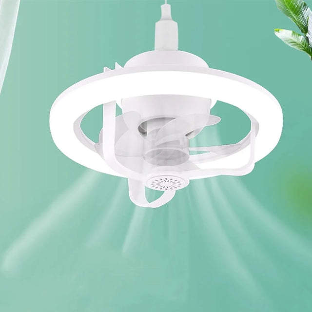 White ceiling fan with light on a green background