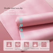 Pink yoga mat with text and icons on a pink background
