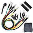 Set of resistance bands with handles and attachments on a white background