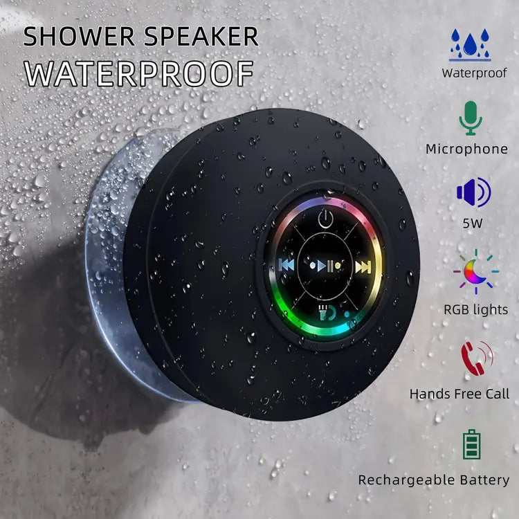 Shower speaker with RGB lights and waterproof features on a wet surface