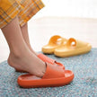 Orange and yellow slides on a textured surface with a blurred background
