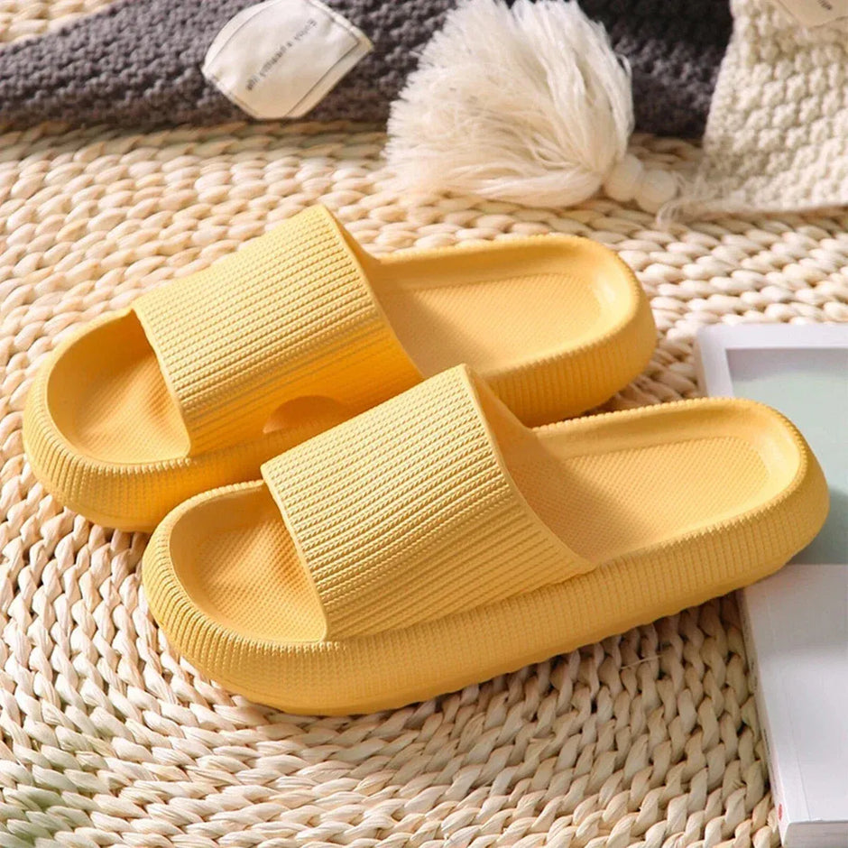 Yellow slippers on a woven mat