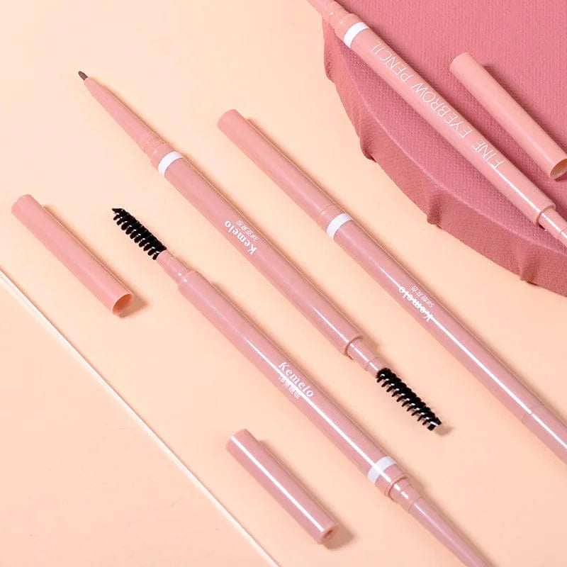 Set of pink makeup pencils with various tips on a peach background