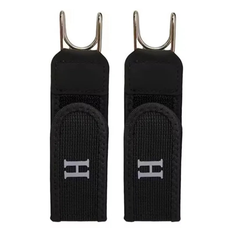 Two black strap ends with metal hooks on a white background