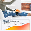 Person using a hot compress on their knee with temperature adjustment levels displayed.